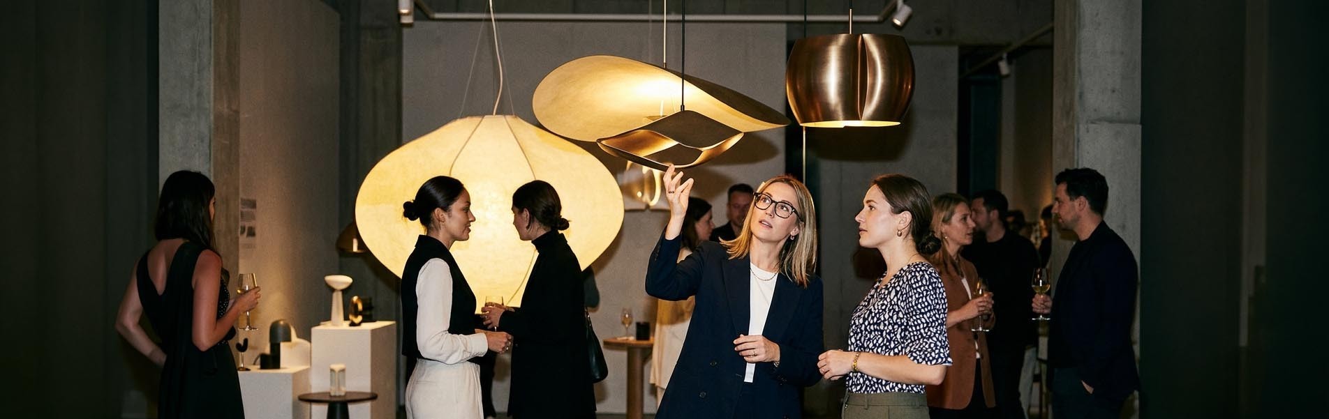 Architectural community gathering with drinks and informal discussions